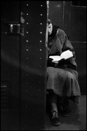 A woman reading on the subway, 1957. © Inge Morath 